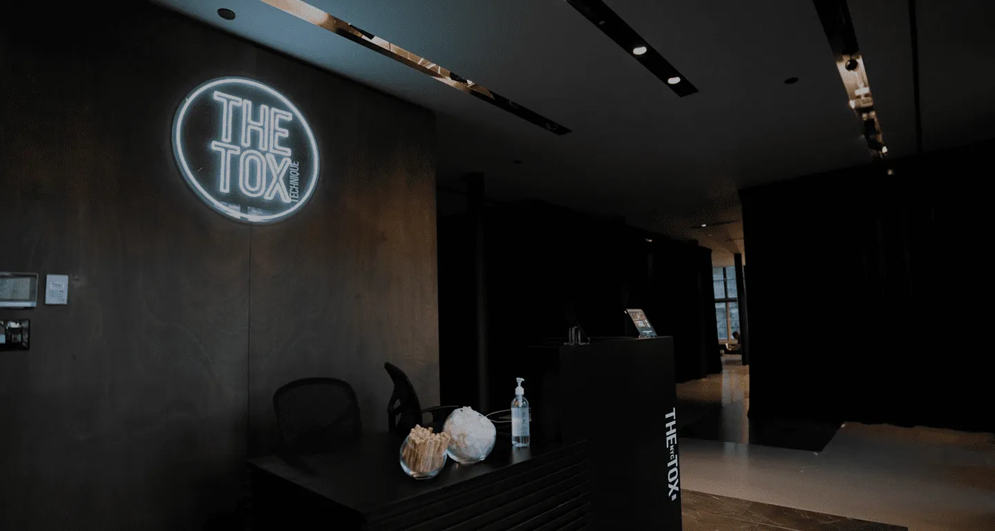 The Tox reception with neon logo
