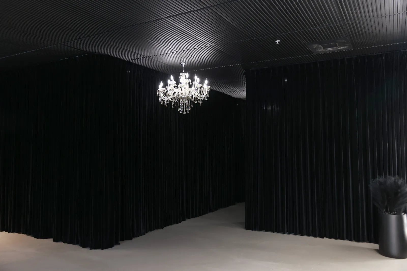 Treatment lounge under a chandelier